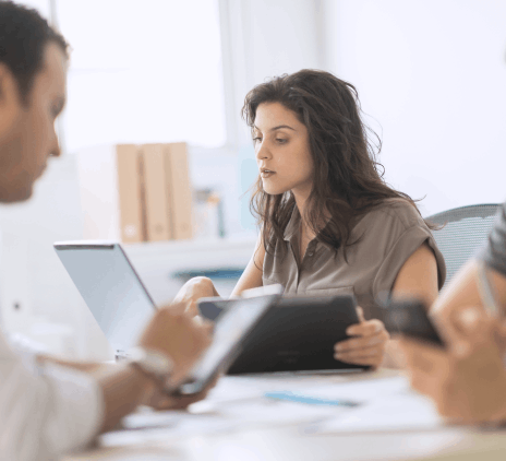 Women with pad and laptop